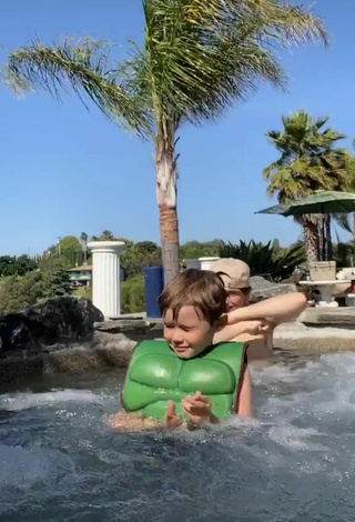 6. Titillating Devenity Perkins in Green Bikini Top at the Swimming Pool