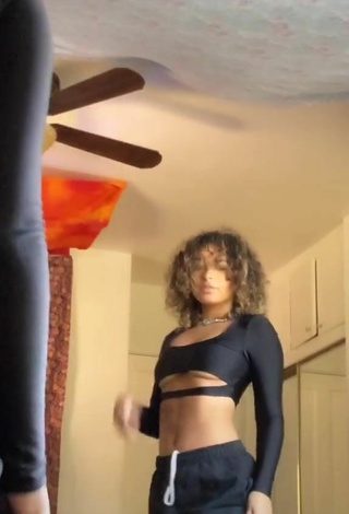 5. Sultry Devenity Perkins in Black Crop Top (Underboob)