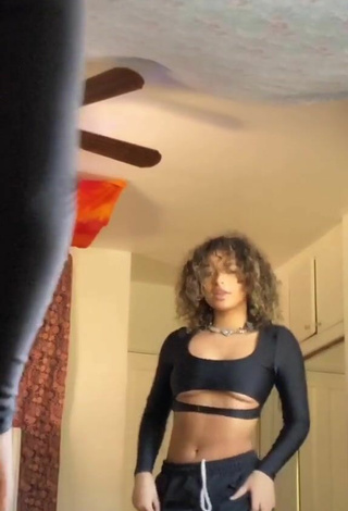 6. Sultry Devenity Perkins in Black Crop Top (Underboob)