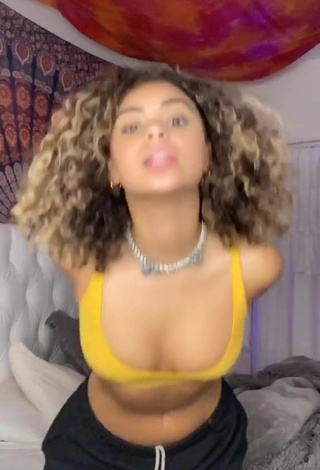 Sultry Devenity Perkins Shows Cleavage in Yellow Sport Bra and Bouncing Tits