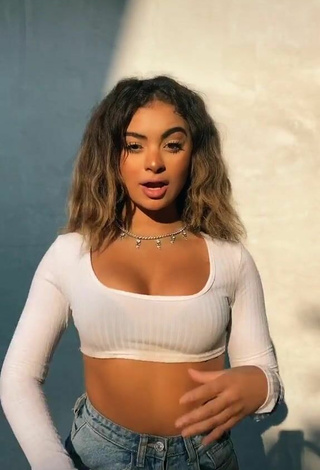 2. Erotic Devenity Perkins Shows Cleavage in White Crop Top and Bouncing Tits