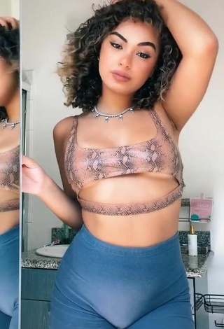 Amazing Devenity Perkins Shows Cleavage in Hot Snake Print Crop Top (Underboob)