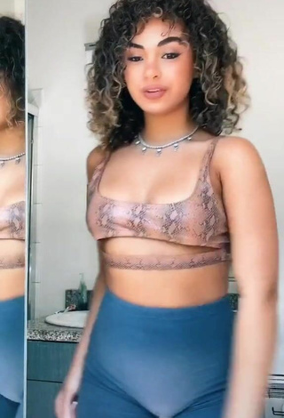 3. Amazing Devenity Perkins Shows Cleavage in Hot Snake Print Crop Top (Underboob)