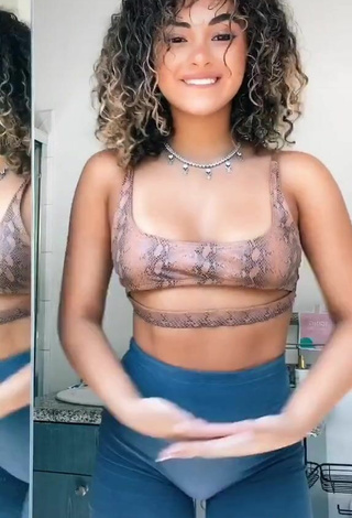 5. Amazing Devenity Perkins Shows Cleavage in Hot Snake Print Crop Top (Underboob)