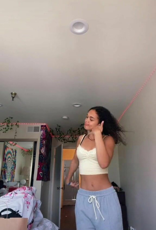 6. Luscious Devyn Winkler Shows Cleavage in White Crop Top