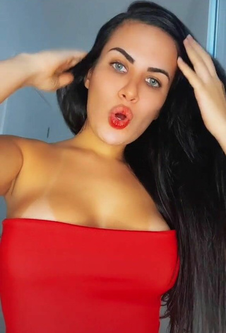 Cute Dine Azevedo Shows Cleavage in Red Top