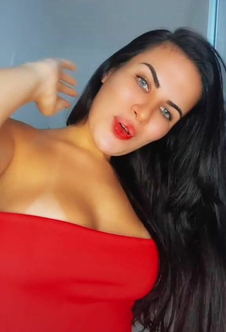 4. Cute Dine Azevedo Shows Cleavage in Red Top