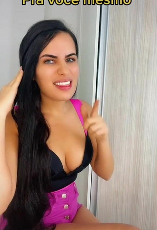 5. Erotic Dine Azevedo Shows Cleavage in Black Top