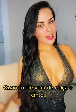 4. Titillating Dine Azevedo Shows Cleavage in Top