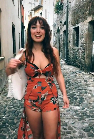 2. Sultry Eleonora Olivieri in Floral Overall in a Street