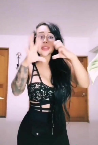 3. Sexy Eve Herrera Shows Cleavage in Black Top