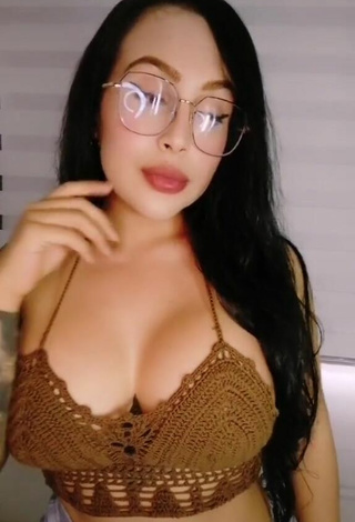 Hottie Eve Herrera Shows Cleavage in Brown Crop Top