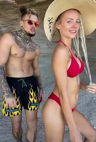 Sultry fit.lovers Shows Cleavage in Red Bikini at the Beach