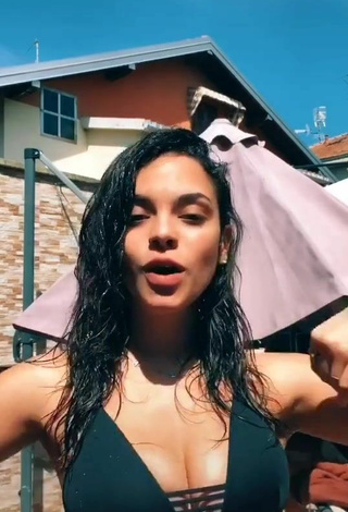 5. Sultry Giulia Paglianiti Shows Cleavage in Black Bikini Top and Bouncing Boobs