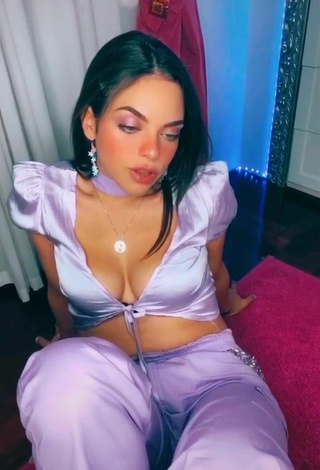 2. Cute Giulia Paglianiti Shows Cleavage in Purple Crop Top