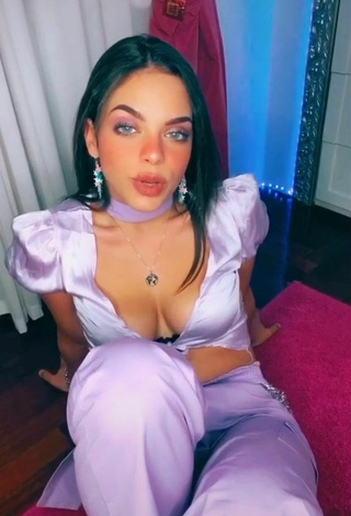 5. Cute Giulia Paglianiti Shows Cleavage in Purple Crop Top