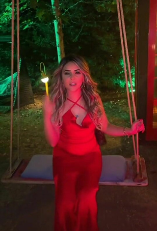 3. Sultry Gizemjelii in Red Dress