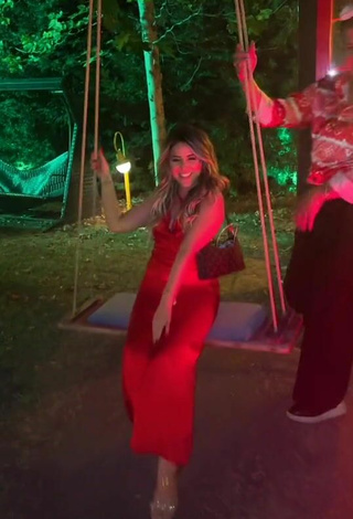 6. Sultry Gizemjelii in Red Dress