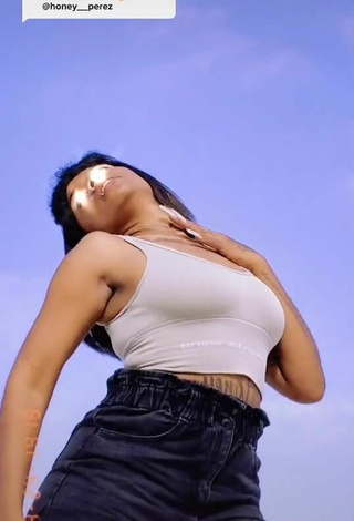 4. Titillating Honey Perez Shows Cleavage in Grey Crop Top