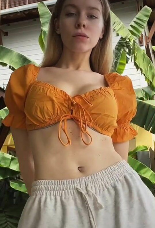 4. Sexy Ira Blanc in Orange Crop Top