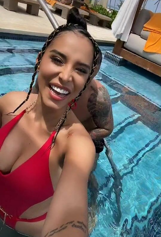 4. Sultry Jessi Pereira Shows Cleavage in Red Swimsuit at the Pool