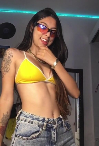 2. Sweetie Julia Guerra Shows Cleavage in Yellow Sport Bra