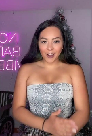 Sultry Karen Bustillos Shows Cleavage in Snake Print Tube Top and Bouncing Boobs