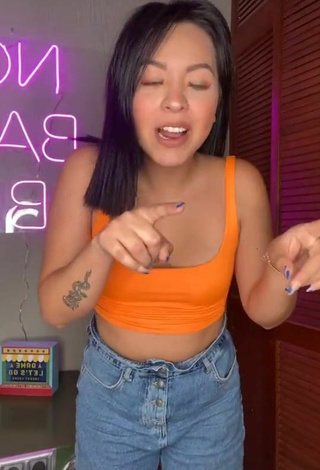 3. Luscious Karen Bustillos in Orange Crop Top