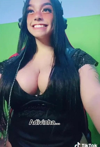 6. Sweetie Karniello Shows Cleavage in Black Bodysuit and Bouncing Boobs