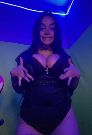 Cute Karniello Shows Cleavage in Black Bodysuit