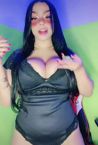 2. Hot Karniello Shows Cleavage in Black Bodysuit and Bouncing Breasts