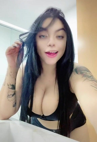 Beautiful Karniello Shows Cleavage in Sexy Black Bra