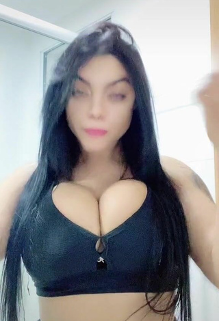 2. Sexy Karniello Shows Cleavage in Black Bra