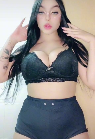 Karniello Shows Cleavage in Sexy Black Bra