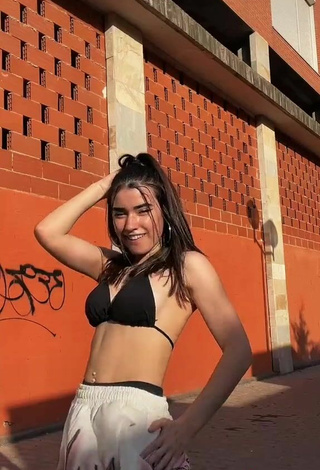 5. Hottie Kiara Brunett in Black Bikini Top in a Street