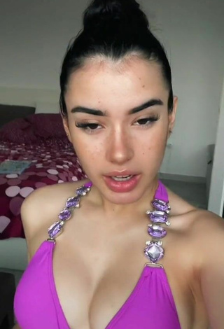 Pretty Kiara Brunett Shows Cleavage in Violet Bikini Top