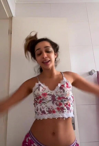 2. Sultry Laura Daniela in Floral Crop Top