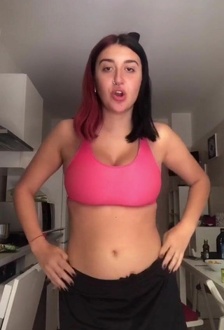 Luscious Linda Stabilini Shows Cleavage in Pink Crop Top