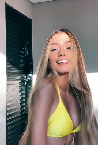 5. Luane Guiné Looks Erotic in Yellow Bikini Top