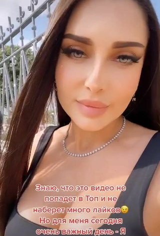 Sultry Lusik Karapetyan Shows Cleavage in Black Top