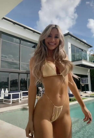 6. Beautiful Mariana Morais Shows Cleavage in Sexy Golden Bikini at the Swimming Pool