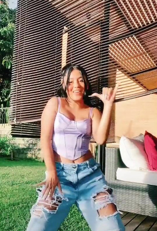 6. Luscious Mafe Vásquez Shows Cleavage in Purple Crop Top