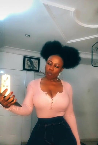 Luscious Lilly Chioma Shows Cleavage in Pink Top