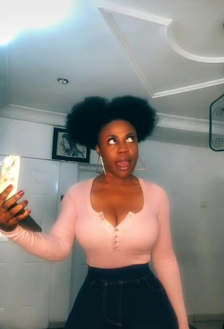 5. Luscious Lilly Chioma Shows Cleavage in Pink Top