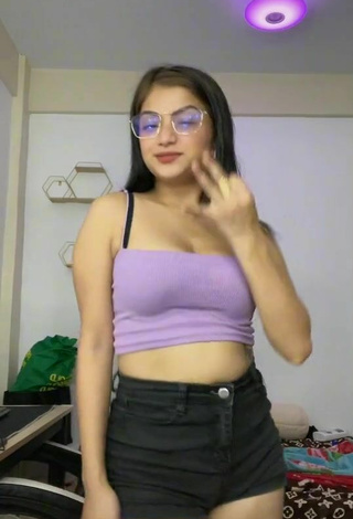 3. Sultry Marylaine Amahit Shows Cleavage in Purple Crop Top