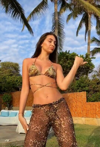 3. Sultry Natalie Vértiz Shows Cleavage in Leopard Bikini Top