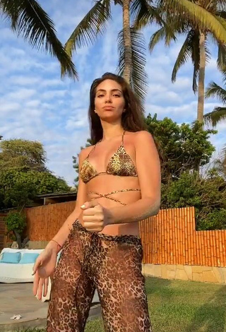 4. Sultry Natalie Vértiz Shows Cleavage in Leopard Bikini Top