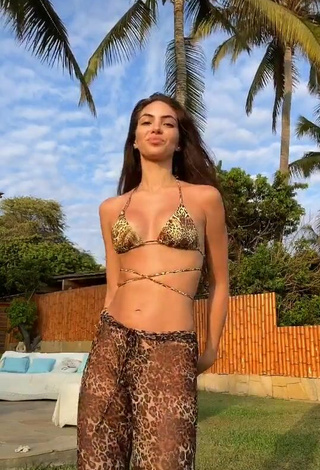 6. Sultry Natalie Vértiz Shows Cleavage in Leopard Bikini Top