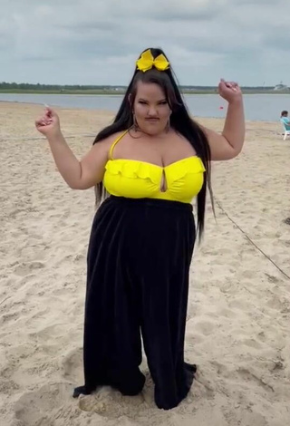 Sultry Netta Barzilai Shows Cleavage at the Beach and Bouncing Boobs