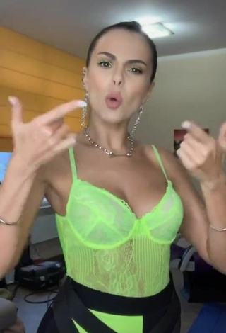 5. Sultry Nastia Kamenskykh Shows Cleavage in Lime Green Bodysuit